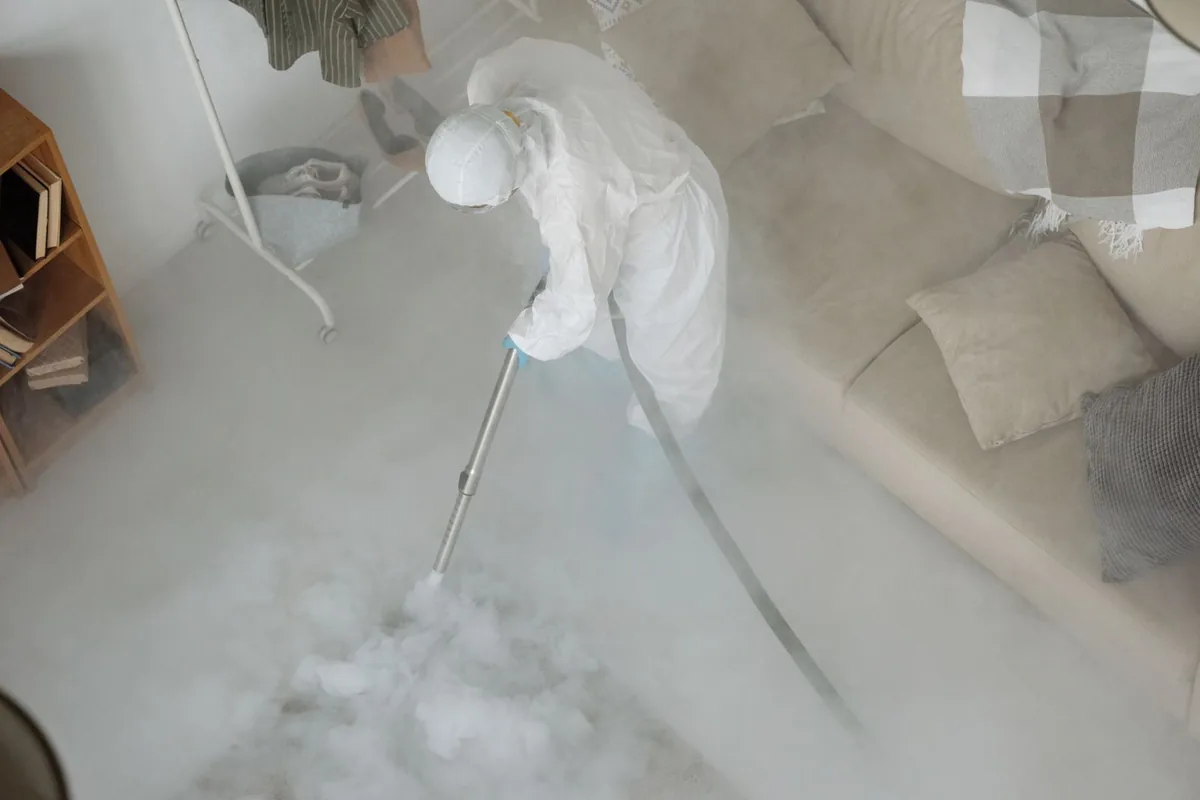 Biohazard cleanup technician in protective equipment, Stafford Courthouse, VA